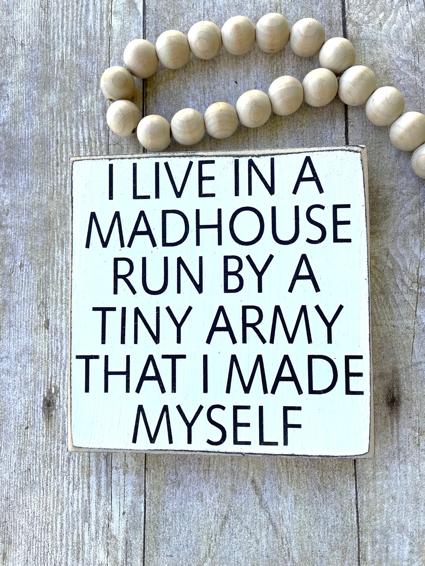 I LIVE IN A MADHOUSE RUN BY A TINY ARMY THAT I MADE MYSELF - WOOD SIGN