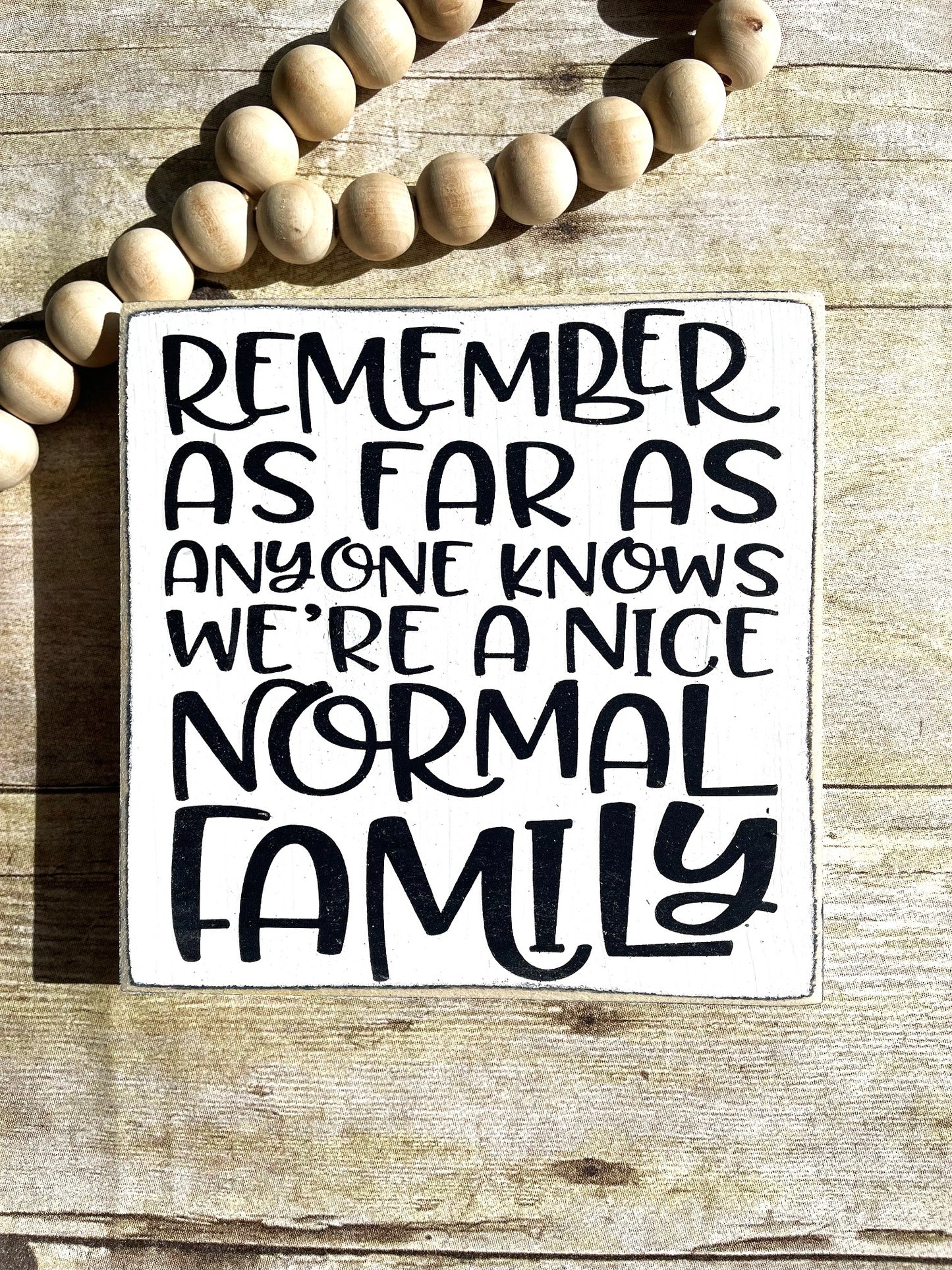 Remember as far as anyone knows we're a nice normal Family Wood Sign