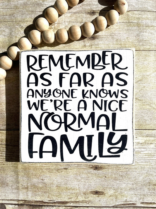 Remember as far as anyone knows we're a nice normal Family Wood Sign